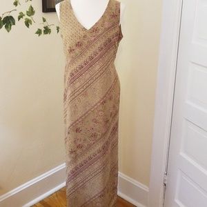 Sleeveless khaki print maxi dress.